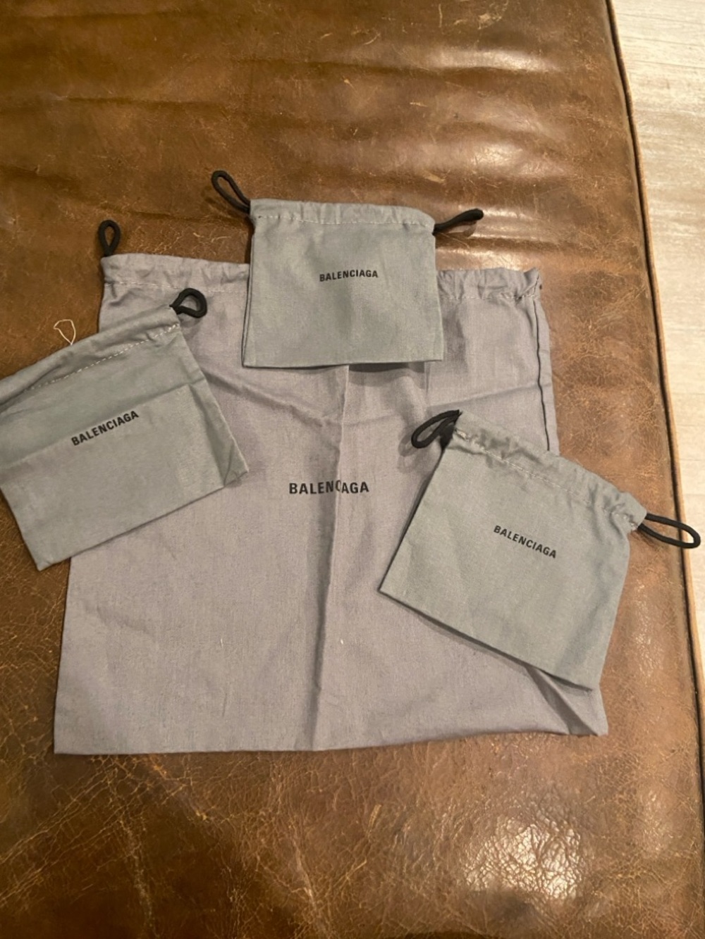 Balenciaga Light Gray Drawstring Pouch Trio
excellent for jewelry accessories